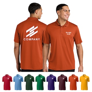 May include: A short-sleeved polo shirt in orange with a white logo on the back that says "COMPANY" and a white name tag on the front that says "NAME TAG". The shirt is available in a variety of colors, including red, blue, green, purple, maroon, yellow, and orange.