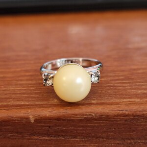 Vintage Sarah Coventry silver tone faux pearl with rhinestones