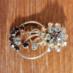 Vintage Art Nouveau style gold tone flower pin with rhinestones