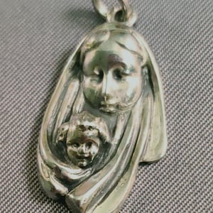 Vintage sterling madonna and child medal