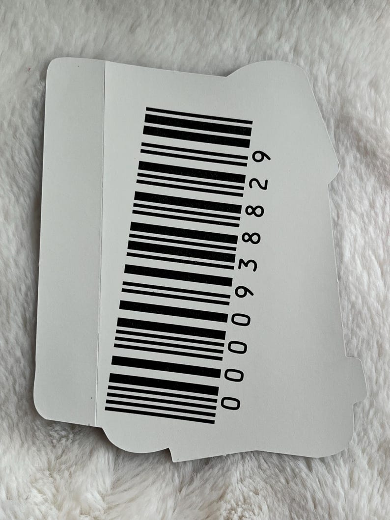 May include: A white sticker with a black barcode and the number 00009388829 printed on it.