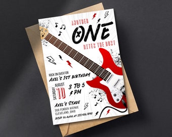 May include: A white and black birthday party invitation with a red electric guitar graphic. The text reads "Another One Bites the Dust" and "Rock on over for Axel's 1st Birthday". The date is August 10th, 3 to 5 PM. The location is Axel's Stage, 309 Fender Avenue, Cleveland, Ohio. RSVP to Katie at 123.456.7890.