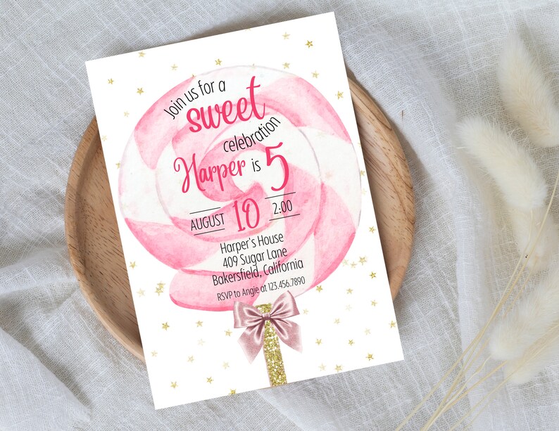 May include: Pink and white lollipop with gold glitter on a stick.  Invitation for a sweet celebration for Harper's 5th birthday.  The invitation includes the date, time, and location of the party.  RSVP information is also included.