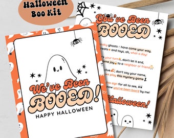 May include: Two printable Halloween "Boo" signs with a ghost and spider design. The text on the signs reads "We've Been Booed! Happy Halloween" and "You've Been Booed!"