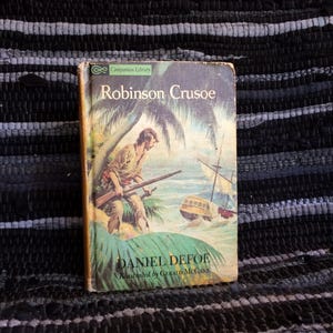 Robinson Crusoe / The Swiss Family Robinson. a Good Two Classics in One Book
