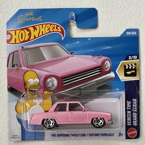 May include: A pink Hot Wheels die-cast car of The Simpsons Family Car, on a blue and white card. The card features Homer Simpson and the text "The Simpsons" and "Hot Wheels". The car is labeled "Screen Time".