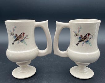 Stoneware Pedestal Featuring a Transferware of a Goldfinch and Berries Pair of 2 Coffee/Tea Mugs