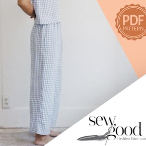 May include: A light blue and white gingham pattern two-piece outfit. The outfit includes a top and wide-leg pants. The image also includes a PDF pattern logo and the text "sew.good Fashion Hand made".