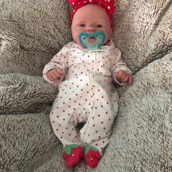 Katie, 15 inches, full body soft silicone reborn baby, painted, weighted, and can take preemie pacifier