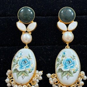 Dark green earrings with floral design
