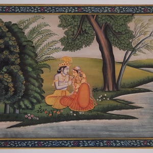 May include: A traditional Indian painting depicting a couple in a lush green landscape. The man is wearing a yellow robe and the woman is wearing a red and orange sari. They are sitting by a river under a large tree.