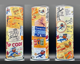 May include: A cylindrical tumbler featuring a collage of vintage postal service graphics. The design includes illustrations of a mail carrier, postage stamps, and text promoting the use of zip codes. The color palette is dominated by yellow, orange, and blue.