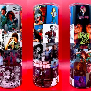May include: A stainless steel tumbler featuring a collage of images and album art related to "Weird Al" Yankovic. The design includes various photos of the musician and album covers, with a red background.