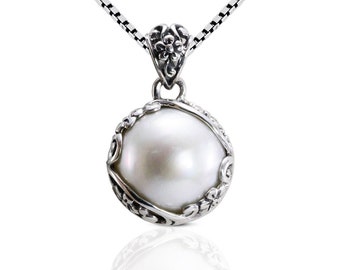 mabe pearl pendant with beautiful  floral art edge in 925 sterling silver