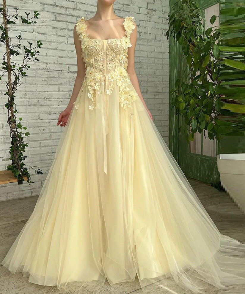 yellow and white wedding dress