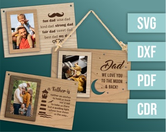 May include: Three wooden signs with photo frames and text. The first sign says "fun dad wise dad kind dad strong dad fair dad sweet dad best dad my dad". The second sign says "a Father is neither an anchor to hold us back nor a sail to take us there but a guiding light whose love shows us the way...". The third sign says "Dad WE LOVE YOU TO THE MOON & BACK!"