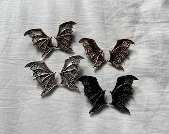 Bat wing hair clips