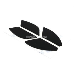 May include: Four black mouse feet pads, designed to replace worn-out feet on a computer mouse.