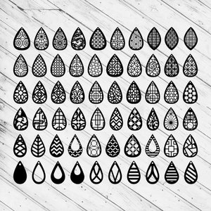 Op de afbeelding: Een set van 60 zwart-witte oorbelontwerpen in de vorm van een traan. De ontwerpen bevatten verschillende geometrische patronen en vormen.