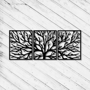 May include: Three black metal wall art panels featuring a stylised tree branch design. The panels are arranged side-by-side and create a modern and minimalist look.