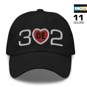 May include: Black baseball cap with white embroidered text "302" and a red heart with white embroidered text "DE" in the center.