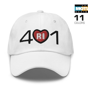 May include: White baseball cap with a red heart and the text "401 RI" embroidered on the front.