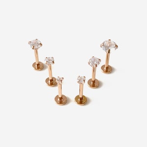 Rose gold screw back earrings top