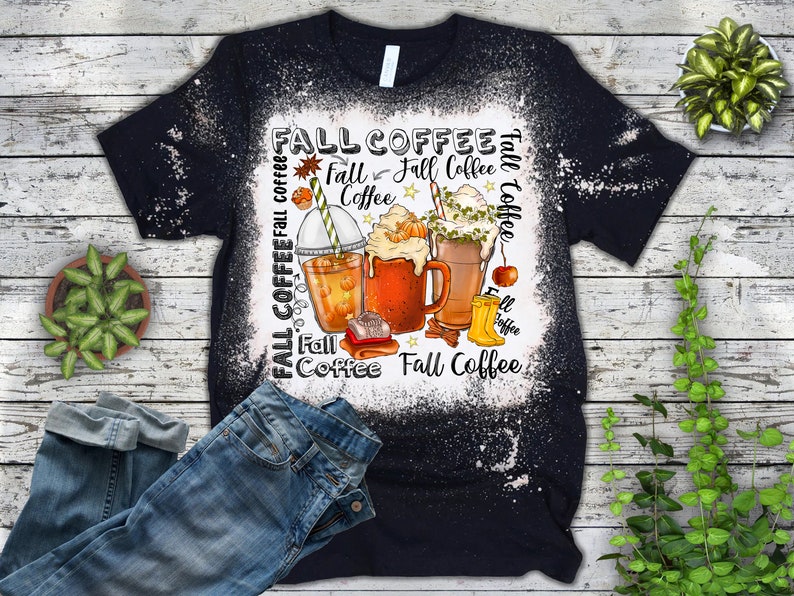 May include: Black t-shirt with a white bleach design featuring fall-themed coffee drinks, leaves, and the text "Fall Coffee".