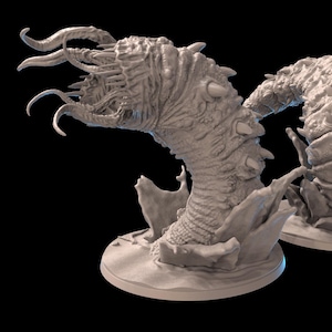 May include: Two grey, detailed, 3D printed miniature figures of a worm-like creature with multiple tentacles and a segmented body. The figures are posed in a curled position, with one figure's head raised and the other figure's head lowered. The figures are set on a circular base.