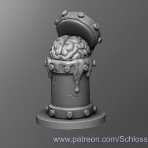 Op de afbeelding: Een 3D-geprint model van een hersenen in een metalen container met een afneembaar deksel. De container heeft een getextureerd oppervlak en is versierd met kleine metalen klinknagels. De hersenen zijn gedeeltelijk bedekt met een viskeuze substantie die uit de container lijkt te druppelen.