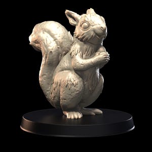 May include: A detailed, white, ceramic sculpture of a squirrel holding a nut in its paws. The squirrel is standing on a black circular base.