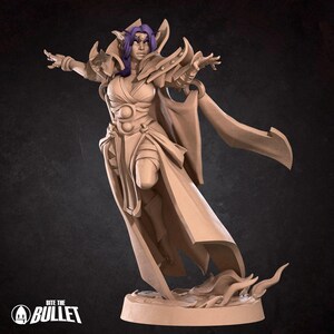 May include: A tan-colored fantasy figurine of a humanoid character with pointed ears and purple hair, wearing ornate armor and a flowing robe. The character is in a dynamic pose with arms outstretched, standing on a base with the text Bite The Bullet.
