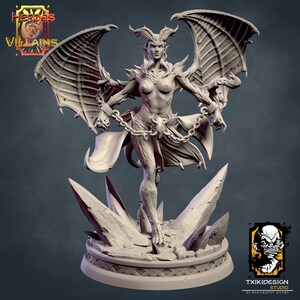 May include: A gray, detailed miniature figurine of a female demon with horns, wings, and chains. The demon is standing on a base of jagged, crystalline rocks.
