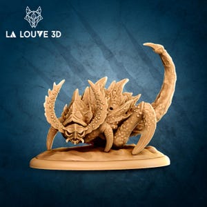 May include: A tan-coloured, 3D-printed scorpion figurine with a detailed exoskeleton, curved tail, and large pincers. The figurine is on a circular base. The logo "LA LOUVE 3D" is in the upper left corner.