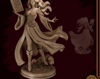 May include: A beige resin statue of a woman holding a book and gesturing with her right hand. She wears a long dress, boots, and has long flowing hair. A smaller, darker version of the statue is to the right. The base has a circular design.