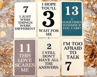 May include: Six white cards with black text and numbers. The cards have different messages, including "I just wish things were different", "I hope you'll wait for me", "I'm too afraid to talk", "This love scares me", "I still don't have all the answers", and "I sometimes wonder if you care?"