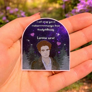 May include: A sticker with a purple background featuring a portrait of a man and text that reads "I will wrap you in maharrrrrmmanyoo know thadyuhlbessay. Lemme sirn!" with two purple hearts.