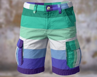 May include: Colorful striped cargo shorts in shades of green, blue, white, and purple. The shorts feature a button closure, belt loops, and two cargo pockets. The design is a horizontal stripe pattern.