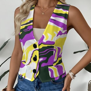 May include: A sleeveless waistcoat featuring a vibrant, swirling marble-like pattern in shades of bright yellow, deep purple, dark green, and white. The garment has a V-neckline, three black buttons down the front, and two small rectangular front pockets.