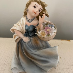 Lefton Vintage Bisque China Girl in Blue Dress Holding a Basket of Delicate Flowers
