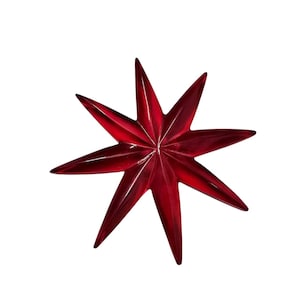 May include: A glossy, eight-pointed star in a deep red hue. The star's facets catch the light, creating a radiant effect. This decorative star is ideal for holiday decor or as a unique accent piece.