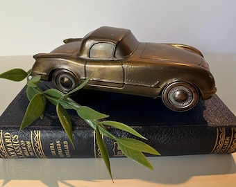 Vintage Banthrico 1953 Corvette gegoten metalen bank