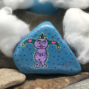 A small lucky monster as a talisman &quot;Pebble Art&quot; hand-painted on natural stone.