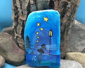 Grimm's Fairy Tales: Star Money Motif #1. Hand-painted on a flat natural stone/river stone.