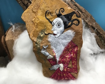 Der "Genießer", mit 24K Blattgold Intarsien geschmückter Edelmann, auf einem  charaktervollen Naturstein handgemalt und verewigt.
