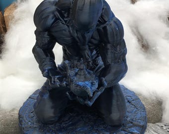 3D printed genie/djinn with magic lamp in black and blue, sitting on a base. Individually created, unique design #3