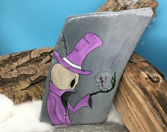 The soap bubble man, a unique, hand-painted comic-style piece immortalized on a natural stone.