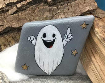 A small, friendly ghost, not just for Halloween, hand-painted and immortalized on a natural stone.