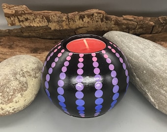 Mandala tea light in a round shape in puristic purple tones