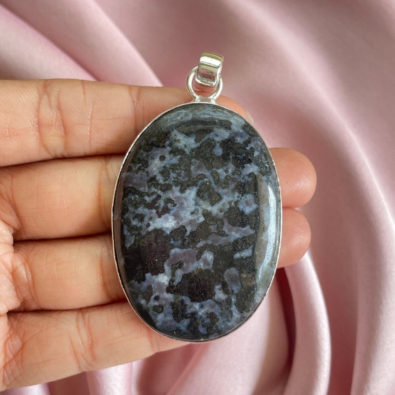 Merlinite pendant hotsell